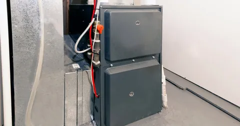 A gas furnace installed in a utility room