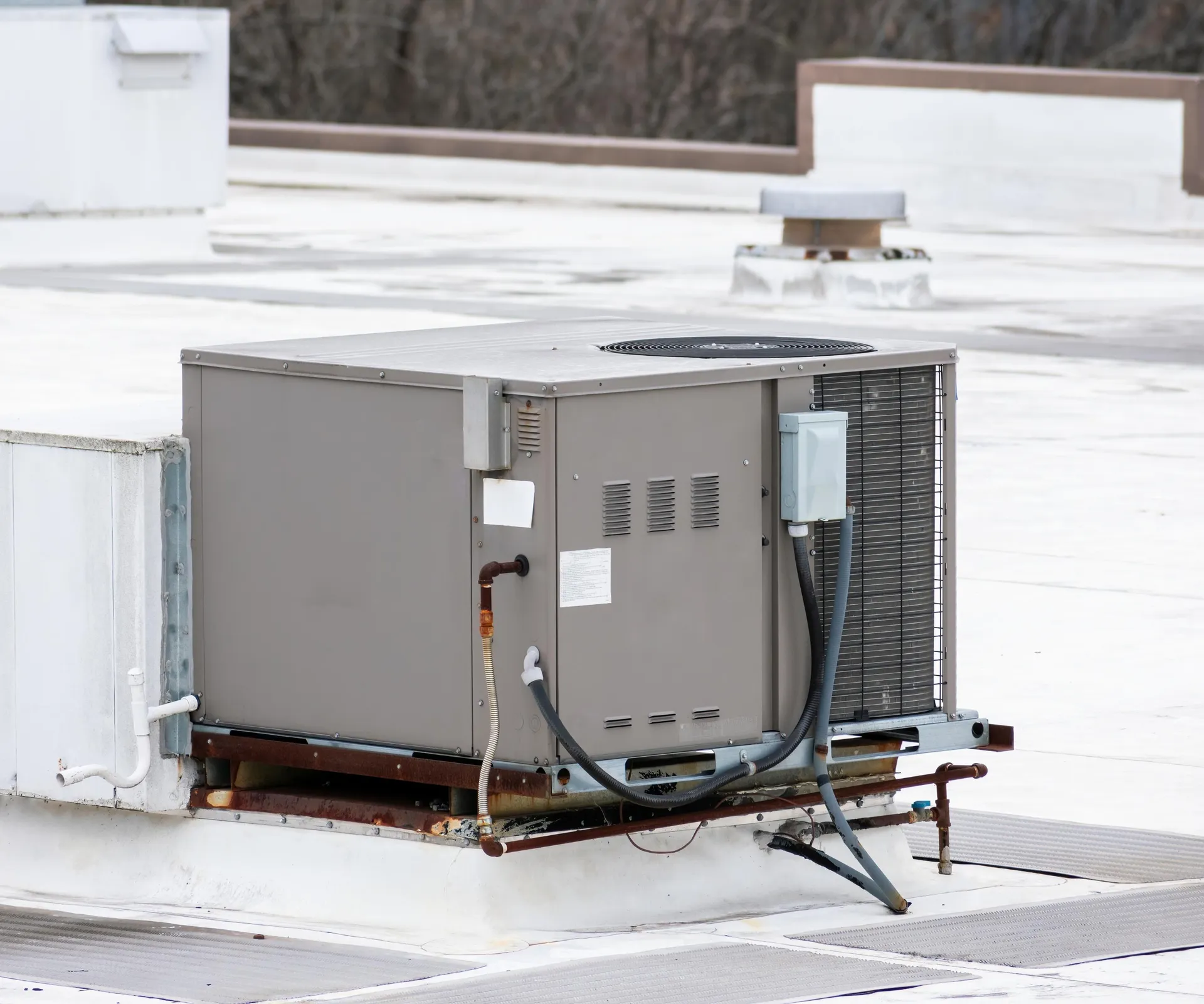A packaged rooftop HVAC unit on a commercial building’s flat roof